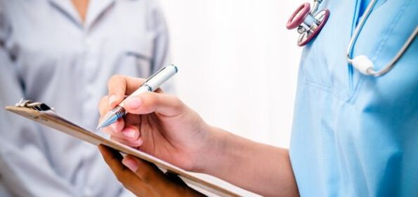 doctor prescribes treatment for low back pain